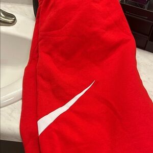 Nike Red Men's Shorts with White Swoosh